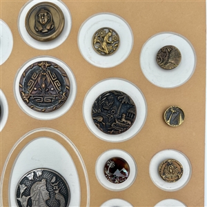 Card of twenty nine Egyptian themed buttons.