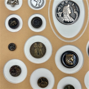 Card of twenty nine Egyptian themed buttons.