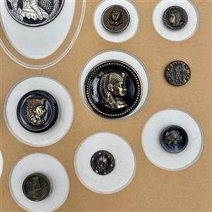 Card of twenty nine Egyptian themed buttons.