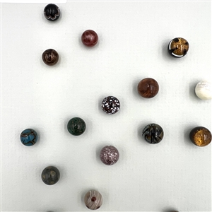 Card of forty three glass ball buttons.