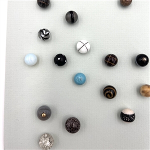 Card of forty three glass ball buttons.