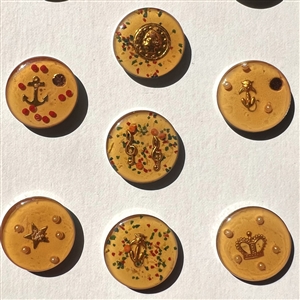 Set of ten Junque Deco buttons.