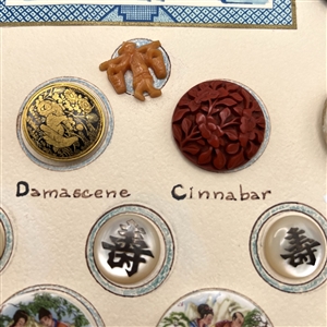 Card of 23 Asian themed buttons.
