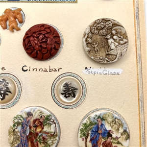 Card of 23 Asian themed buttons.