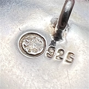 “Mermaid with Moonstone” sterling silver button.
