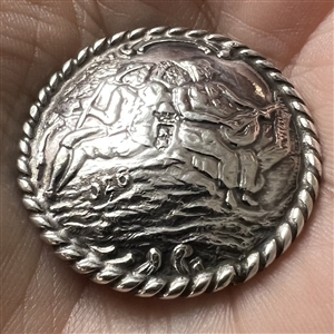 Dutch silver button of man and woman musicians.