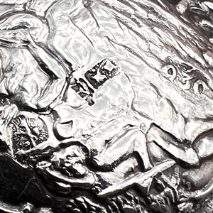 Dutch silver button of man and woman musicians.
