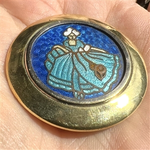 Champlevé enamel button of woman in 18th c. apparel.