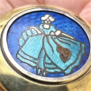 Champlevé enamel button of woman in 18th c. apparel.