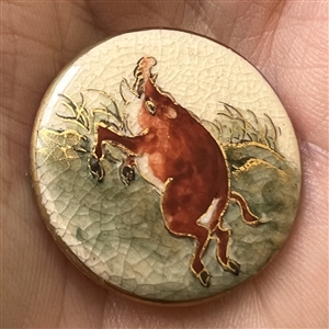 Satsuma button of a rushing, wild boar.
