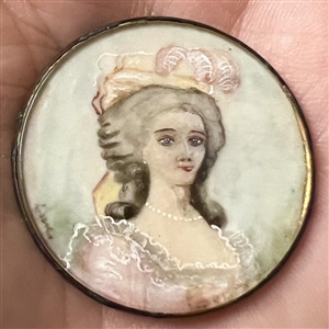 19th c. button painting in pastel tones of woman on natural material.