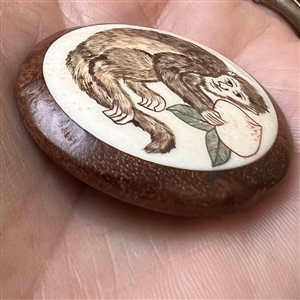 Monkey with turnip wood button.