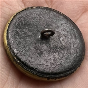 Ivoroid button of a man with floral inner border.