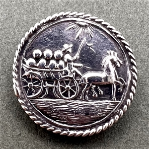 Hallmarked silver button of a horse drawn cart.