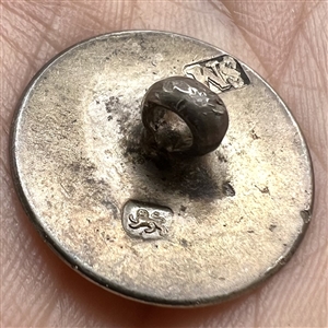 Hallmarked silver sporting button of a bird.