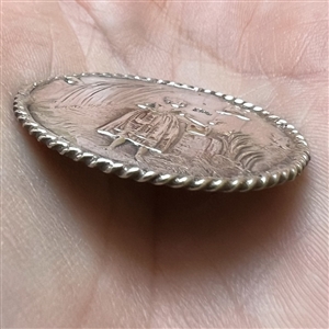 “A Peasant Woman” Continental silver button.