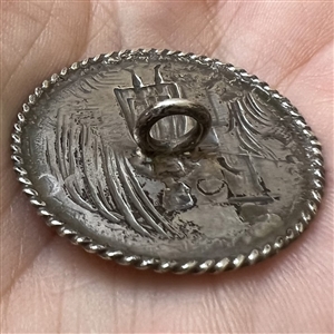 “A Peasant Woman” Continental silver button.