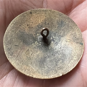 Gay 90’s type button with unique oval iridescent-green glass center.