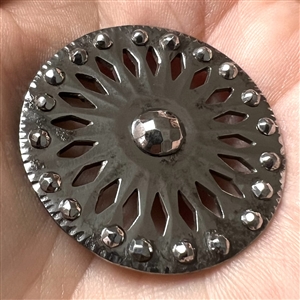 An 18th c. Pierced steel button.