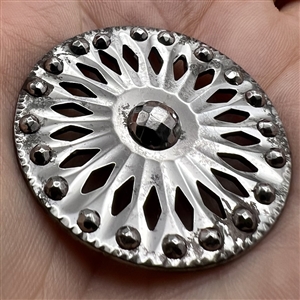 An 18th c. Pierced steel button.