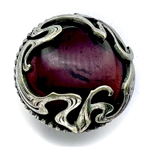 Art Nouveau amethyst glass in white metal button.