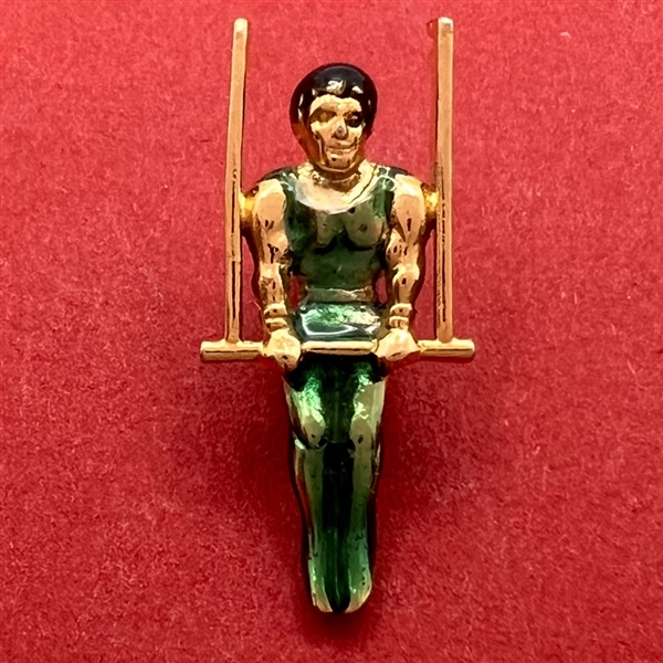 Realistic acrobat on a trapeze “Under the Big Top” favor button.