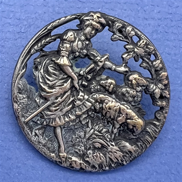 Silvered brass button of shepherdess and lambs.