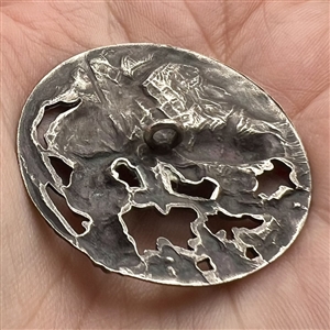 Silvered brass button of shepherdess and lambs.
