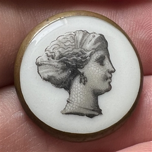 Three assorted buttons of heads including an 18th c. Wedgwood.