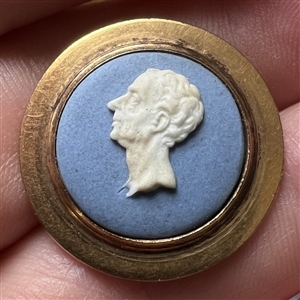 Three assorted buttons of heads including an 18th c. Wedgwood.