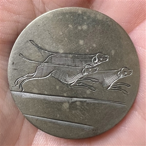 An 18th c. Tombac sporting button of three hunting dogs. 