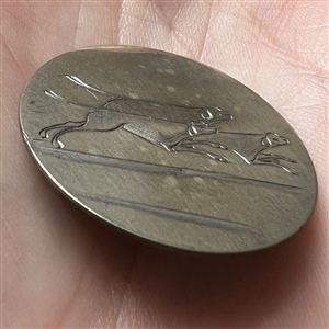 An 18th c. Tombac sporting button of three hunting dogs. 