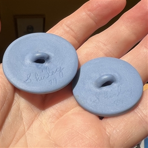 Two Jasperware studio buttons by Shirley Shaw.