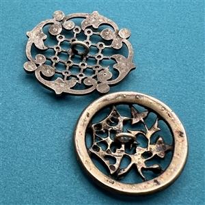 Two Victorian white metal with pastes buttons.