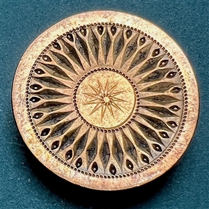 An 18th c. Heavily chased copper Colonial button of a sunburst.