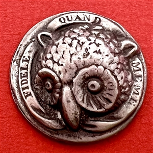 French pewter button of an owl with verbal.