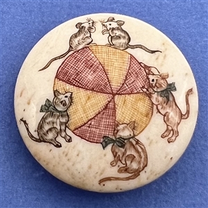 Kittens going after mice natural material button.
