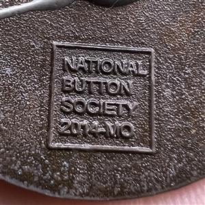 Show favor button of Model T Ford from NBS show 2014.