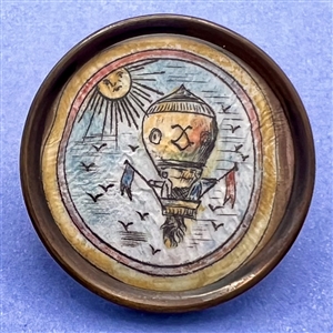 Hot air balloon - ink and paint on paper under glass button.