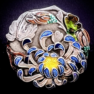 Japanese enamel button of flower garden.
