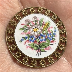 A 19th c. Enamel button of bouquet of wild flowers.