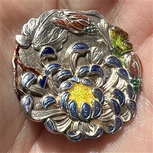 Japanese enamel button of flower garden.