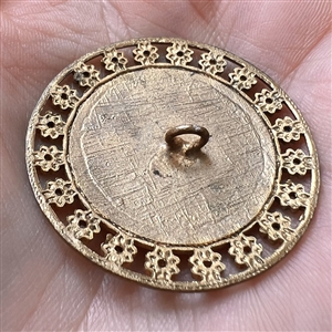A 19th c. Enamel button of bouquet of wild flowers.