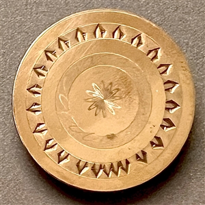 An 18th c. chased copper Colonial button.