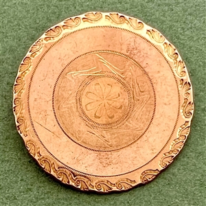 An 18th c. chased copper Colonial button.