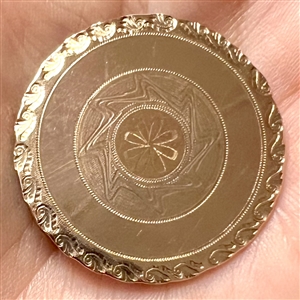 An 18th c. chased copper Colonial button.