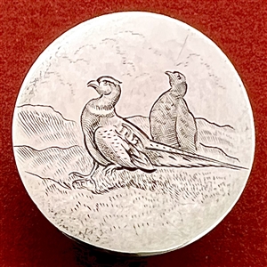 A 19th c. Hallmarked silver sporting button of engraved pheasants. 