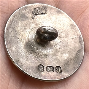 A 19th c. Hallmarked silver sporting button of engraved pheasants. 