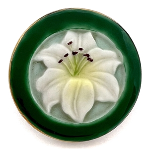 Japanese Kutani button of a flower with green border.