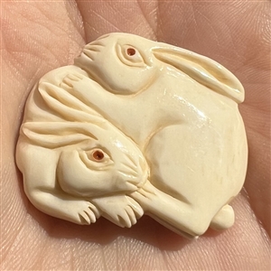 White rabbits Netsuke style natural material button.